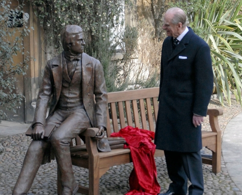 HRH Prince Philip unveiling the life sized statue of the Young Charles Darwin at Christ's College, Cambridge University in 2009