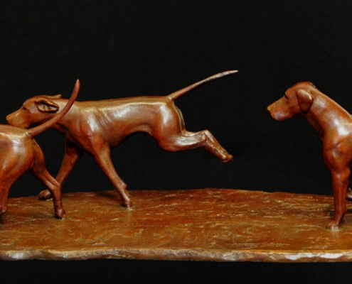 Bronze sculpture of three Fox Hounds