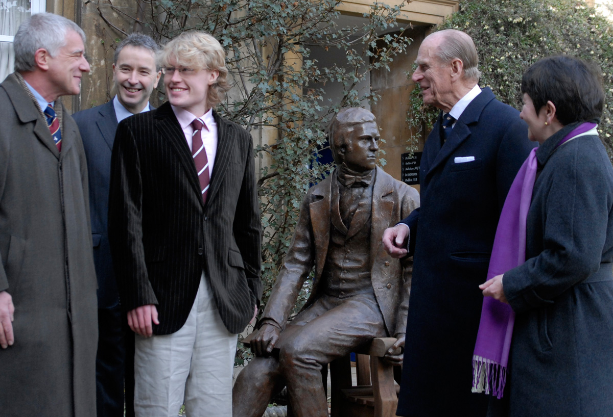 HRH Prince Philip unveiling Anthony Smith's statue of the Young Darwin for Christ's College Cambridge University