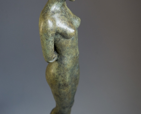 Bronze sculpture of the Ancient Greek Goddess Astraea, a nude female figure statuette